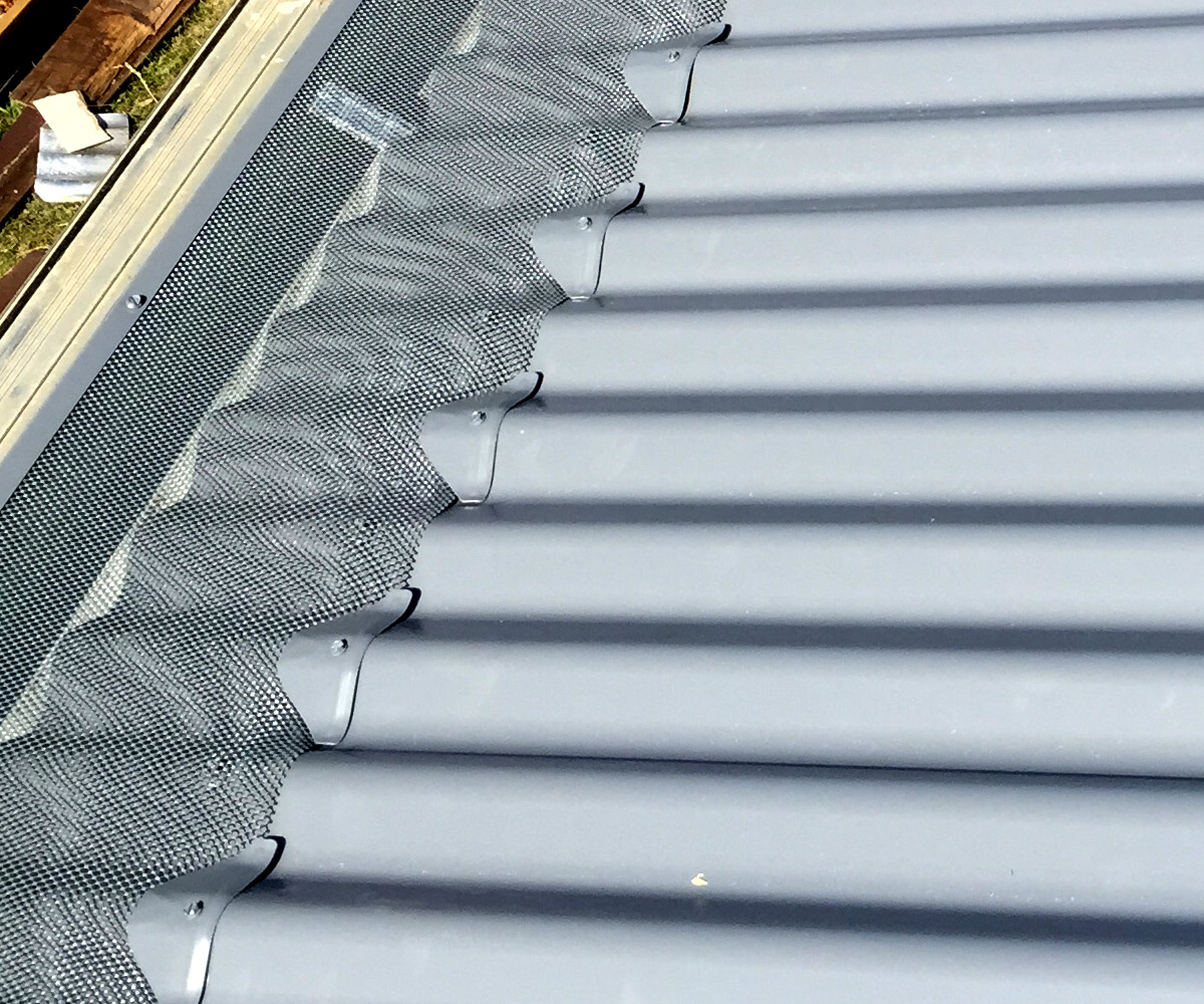 Protect gutters with mesh that prevents buildup of leaves and debris.
